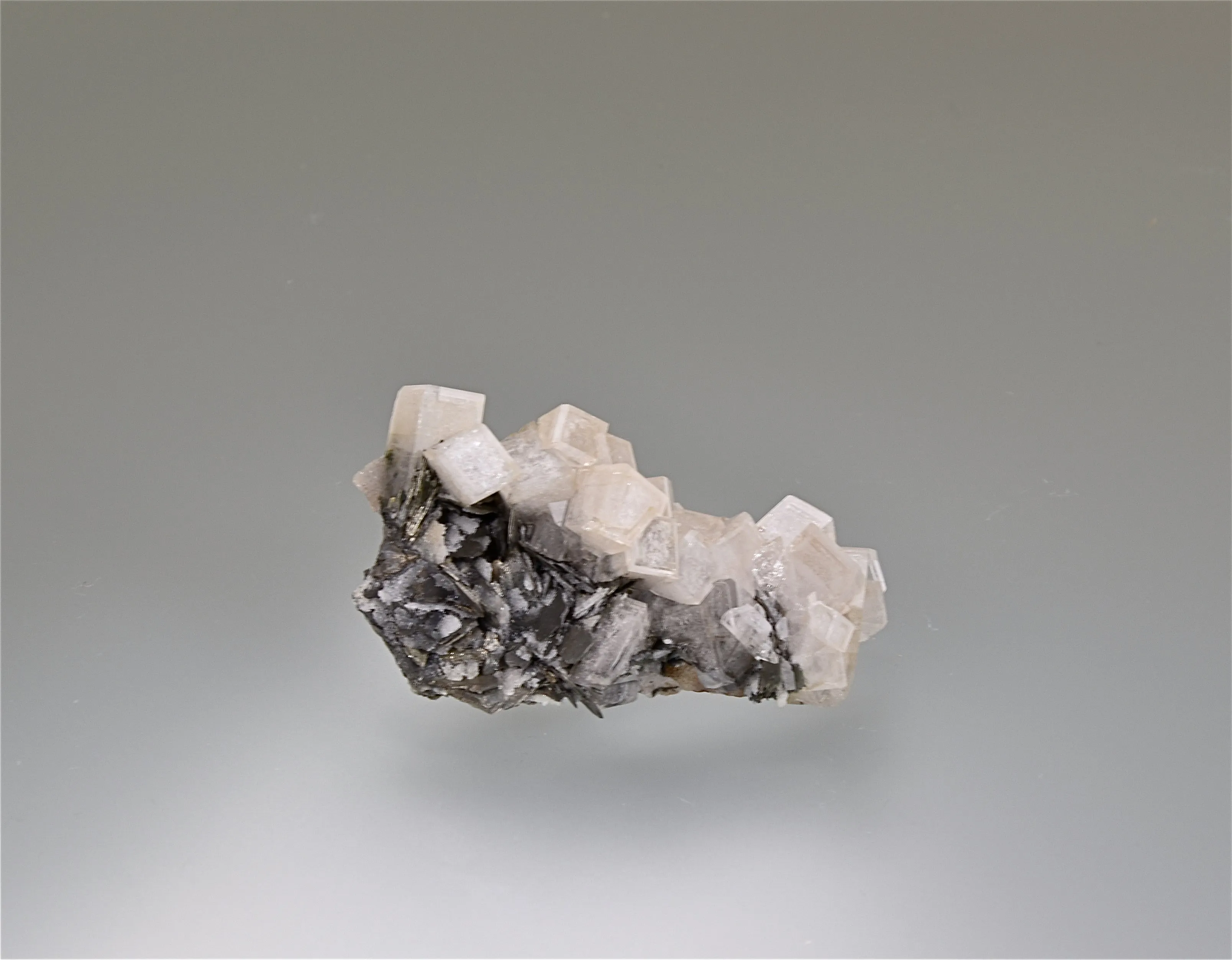 Calcite with Stibnite and Pyrrhotite, Hecla Rosebud Mine, Pershing County, Nevada, Kalaskie Collection #1201, Miniature 1.5 x 3.0 x 5.2 cm, $75.  Online 11/7