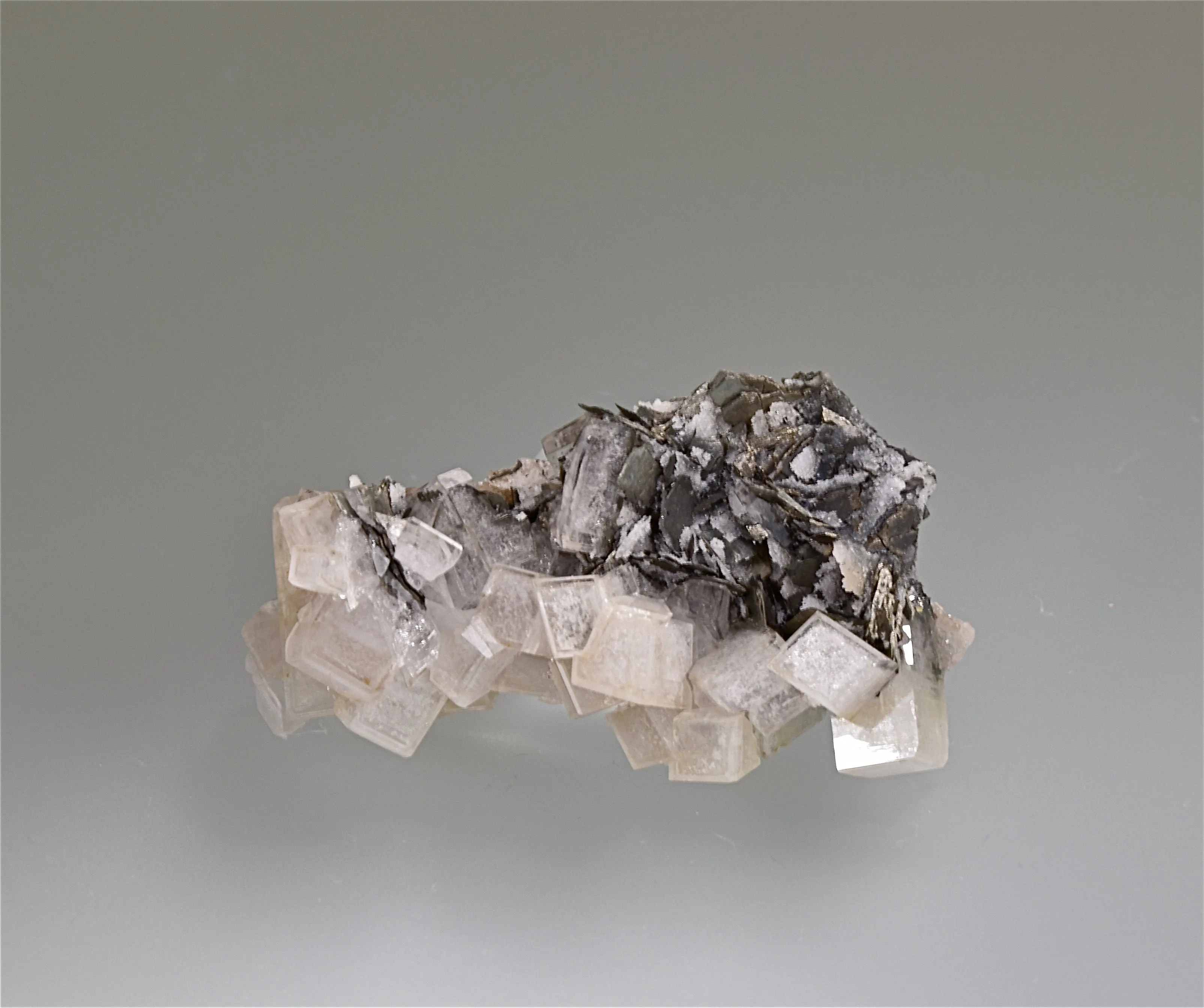 Calcite with Stibnite and Pyrrhotite, Hecla Rosebud Mine, Pershing County, Nevada, Kalaskie Collection #1201, Miniature 1.5 x 3.0 x 5.2 cm, $75.  Online 11/7