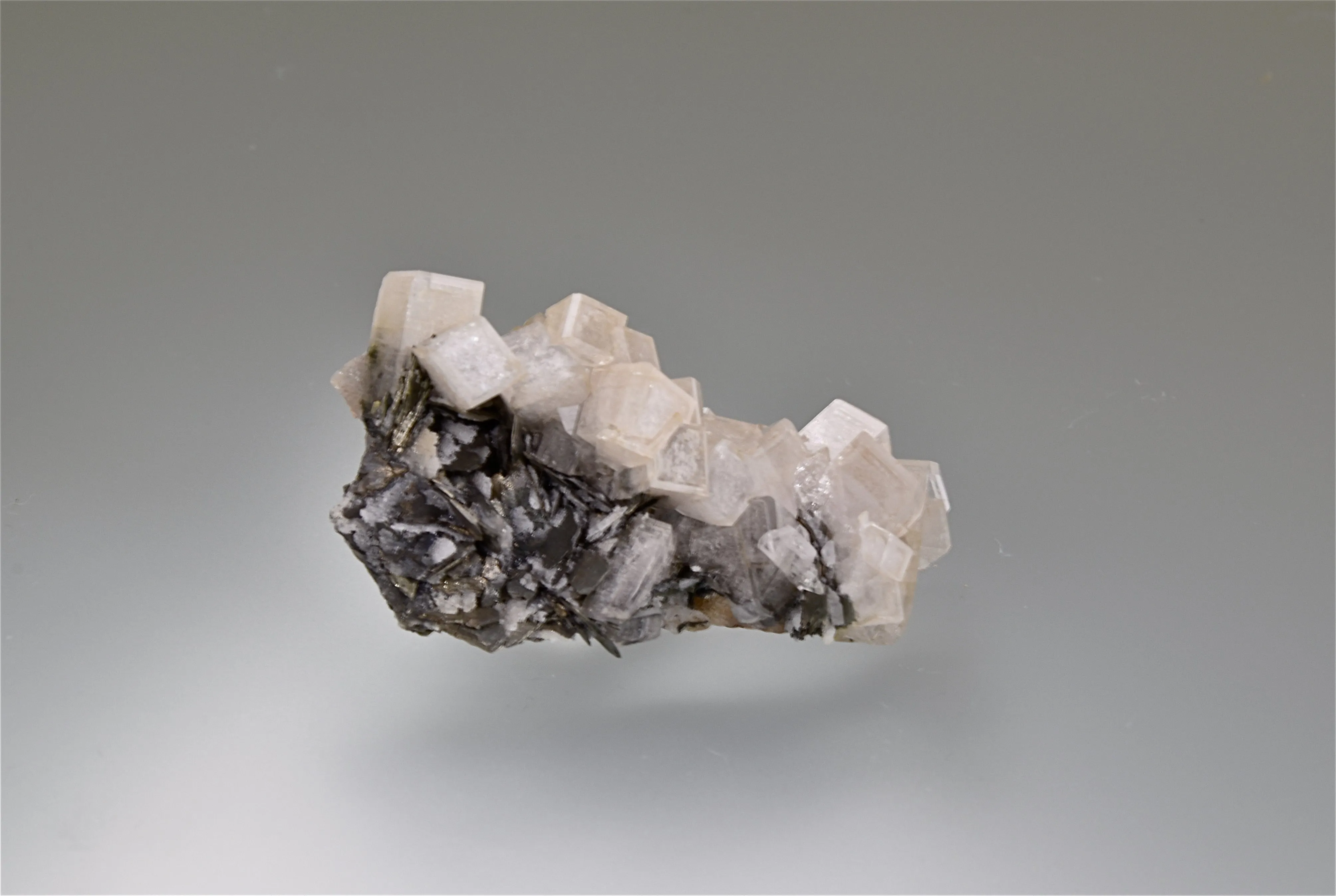 Calcite with Stibnite and Pyrrhotite, Hecla Rosebud Mine, Pershing County, Nevada, Kalaskie Collection #1201, Miniature 1.5 x 3.0 x 5.2 cm, $75.  Online 11/7