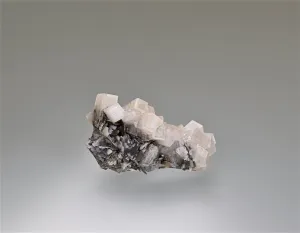 Calcite with Stibnite and Pyrrhotite, Hecla Rosebud Mine, Pershing County, Nevada, Kalaskie Collection #1201, Miniature 1.5 x 3.0 x 5.2 cm, $75.  Online 11/7