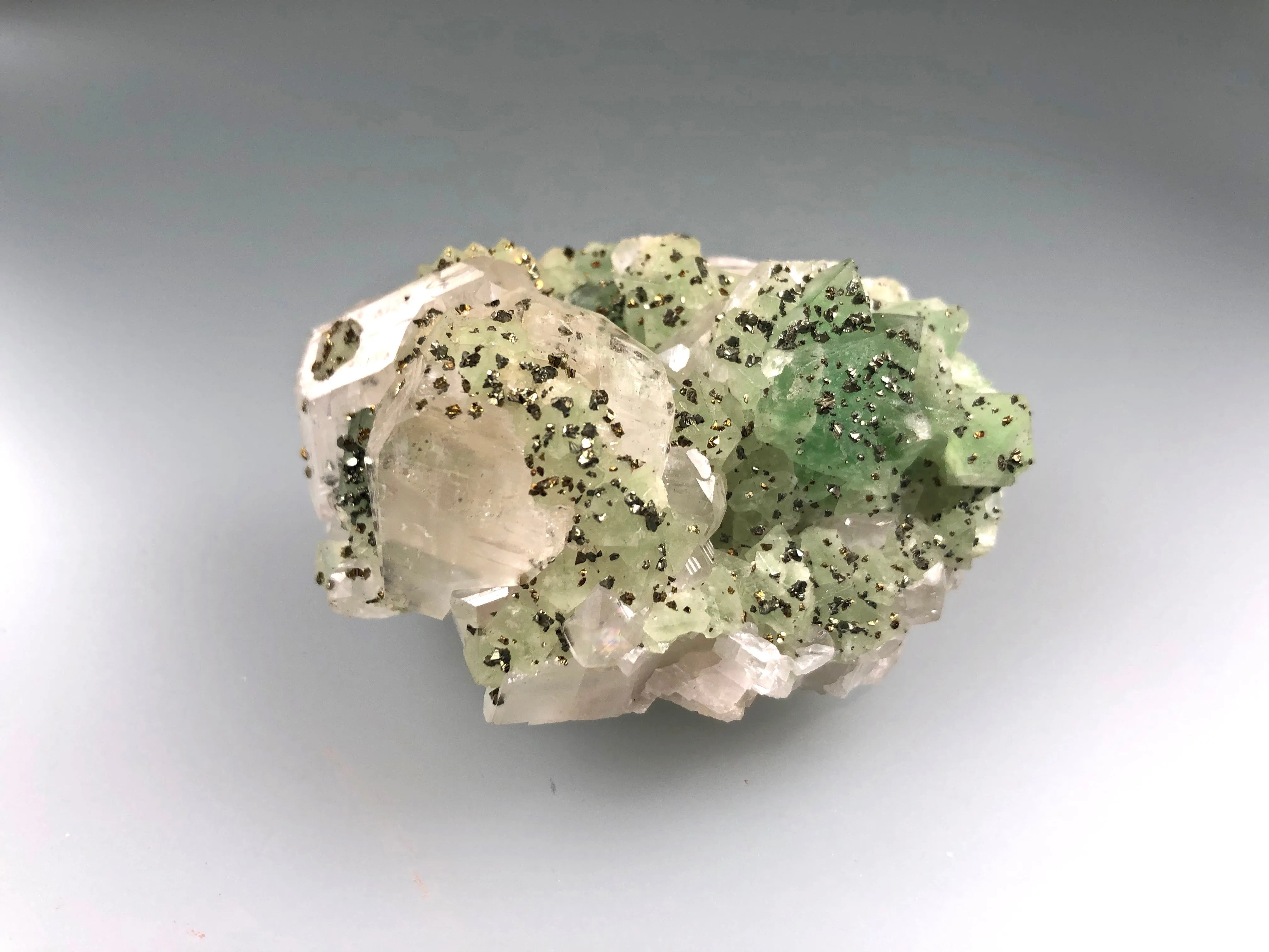 Fluorite and Calcite with Pyrite, Tribag Mine, Nicolet Township, Batchawana Bay, Ontario, Canada, ex. Louis Lafayette Collection #1060, Miniature 3.0 x 4.5 x 6.0 cm, $125. Online Jan. 13